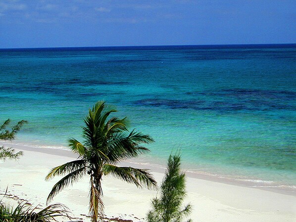 On the beach, sun-loungers, beach umbrellas, beach towels