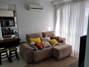 Premier Apartment | Living area | 32-inch Smart TV with digital channels, TV, Netflix - Nautilus Paradise in Penha-SC (Penha)