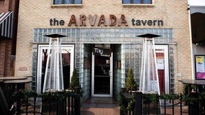 The ARVADA tavern with a tiled facade, two large windows, and outdoor seating with umbrellas. - SuperChic Farmhouse*Old Town Arvada*LightRail*Dogs (Arvada)