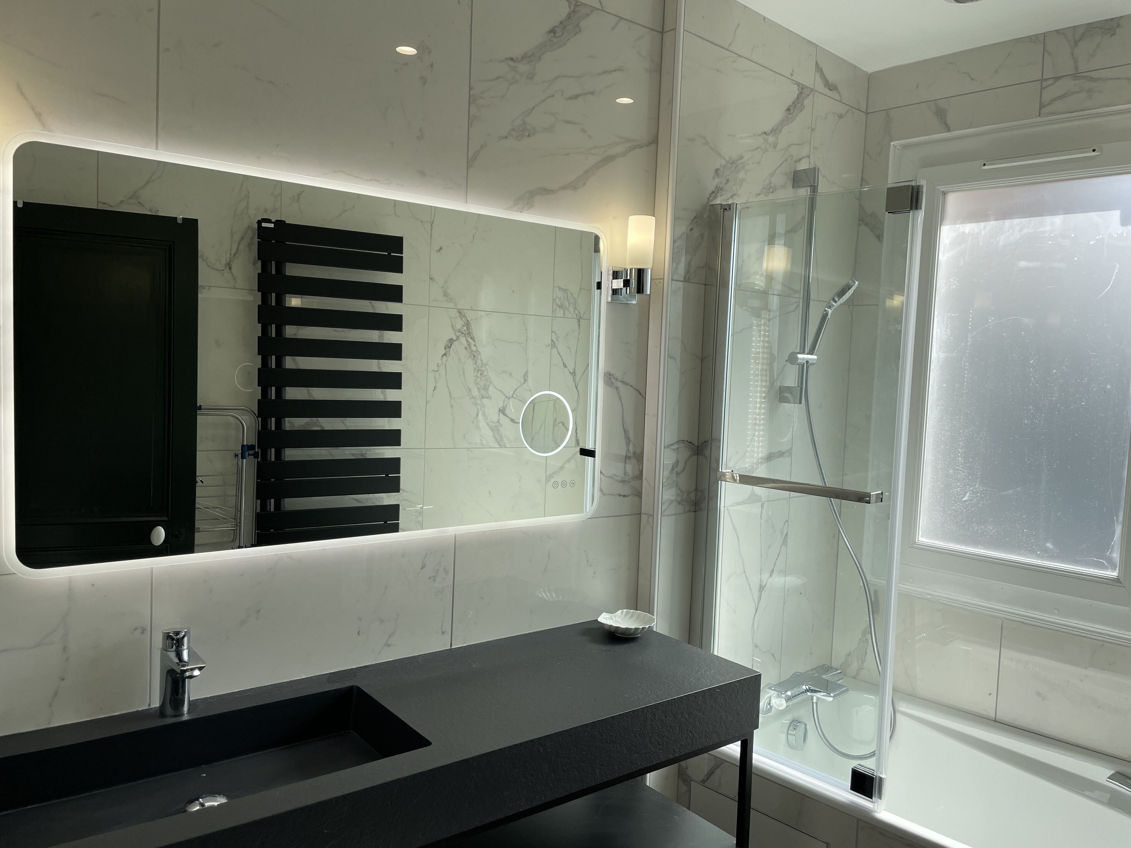 Combined shower/tub, hair dryer, towels, soap