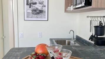 Fridge, microwave, coffee/tea maker, toaster