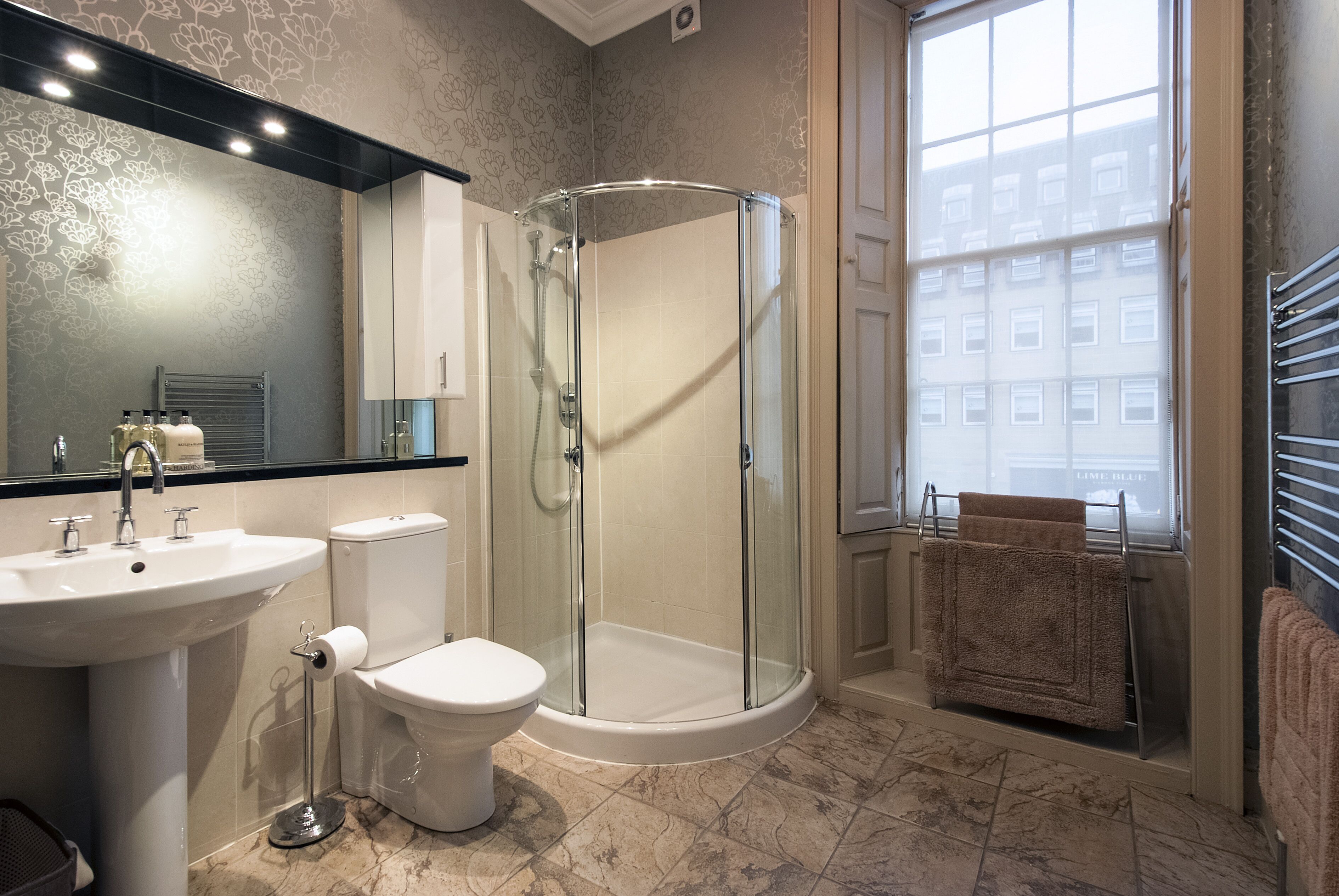 Bathtub, hair dryer, towels, soap