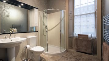 Bathtub, hair dryer, towels, soap