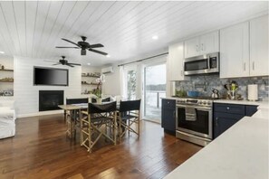 Private kitchen - Updated Cabin with Fireplace, Epic Deck, 2 min from ORV trails - Pet Friendly!  (Mancelona)