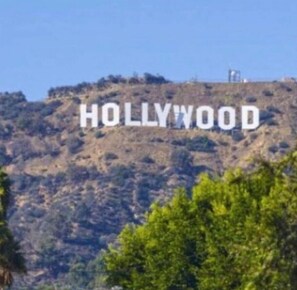 Overlooking the iconic Hollywood sign, this property offers stunning views of the city.
