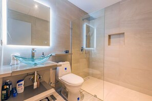 Shower, hair dryer, towels, soap