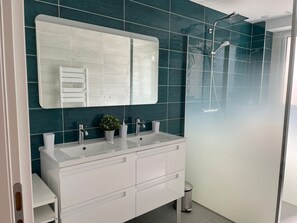 Shower, hair dryer, towels, soap