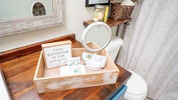 Combined shower/tub, towels, soap, shampoo