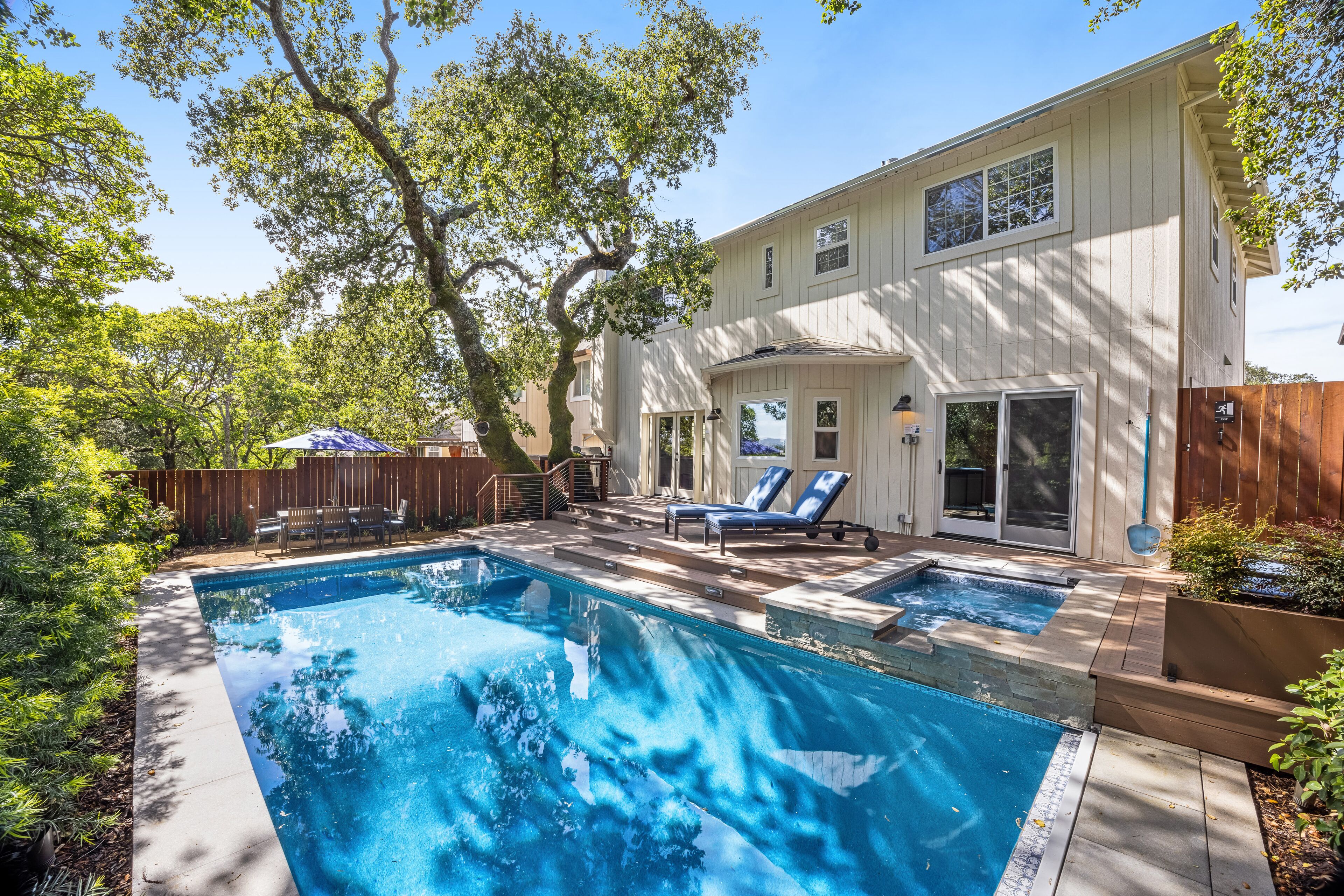 Luxury sun-filled home with private pool and hot tub, gourmet kitchen, & W/D