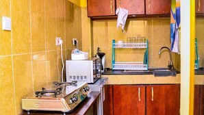 Business Apartment | Private kitchen | Fridge, microwave, cookware/dishes/utensils - Stay.Plus TRM Business Apartments (Nairobi)