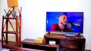 Deluxe Apartment | Television - Stay.Plus TRM Business Apartments (Nairobi)