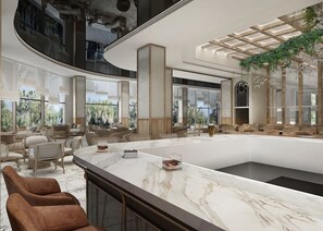 A modern interior with a marble bar, seating area, and large windows offering views of greenery. - Lago Hotel Ex Azura Deluxe Resort and Aqua Sorgun (Manavgat)