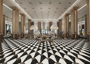 A spacious lobby with a checkered floor, a central seating area, and tall columns. - Lago Hotel Ex Azura Deluxe Resort and Aqua Sorgun (Manavgat)