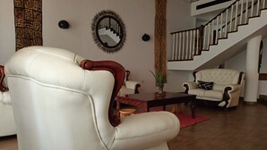 Executive House | Living area - Stay.Plus karen Party House (Nairobi)