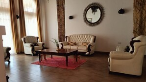 Executive House | Living area - Stay.Plus karen Party House (Nairobi)