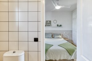 Bathtub, hair dryer, towels