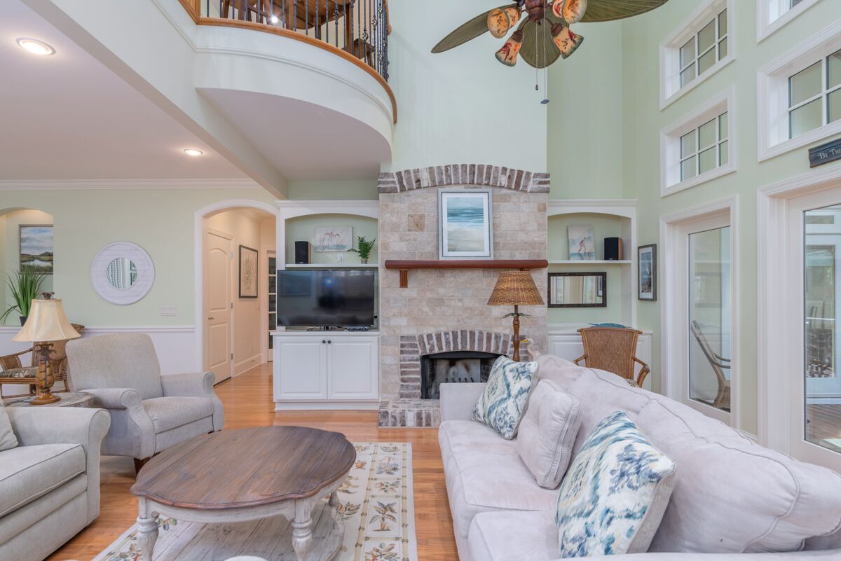 Impeccable 4-bedroom home on Fripp Island with a screened-in porch, elevator, and exercise room
