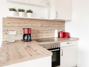 Fridge, oven, dishwasher, coffee/tea maker