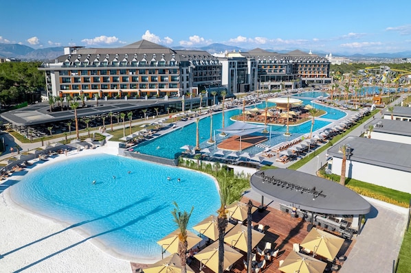 Indoor pool, seasonal outdoor pool, pool umbrellas, pool loungers