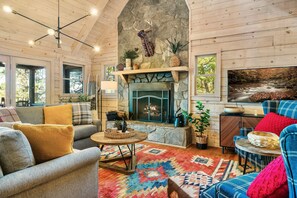 Smart TV, fireplace, books, offices