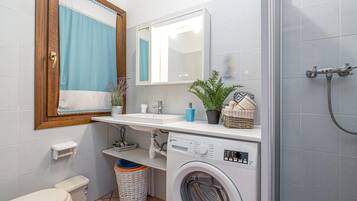 Shower, bidet, towels, soap