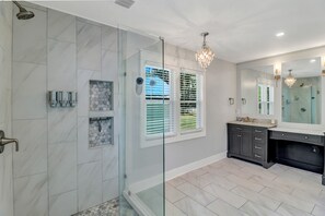 Combined shower/tub, hair dryer, towels, soap
