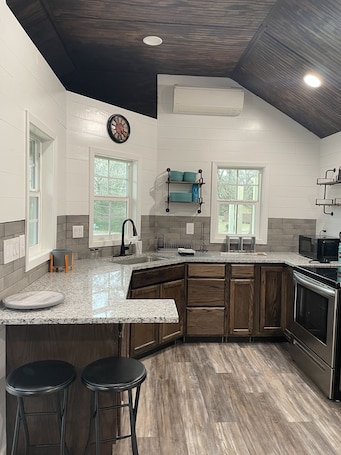 Fridge, microwave, oven, stovetop. Lake o' the Pines Cozy Cabin
