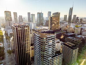 A high-rise building with multiple floors and a rooftop terrace. - Royal Tulip Warsaw Centre (Warsaw)