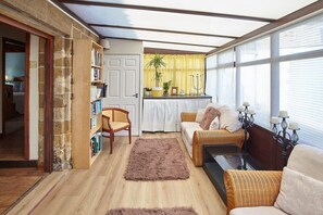TV, fireplace, books, offices