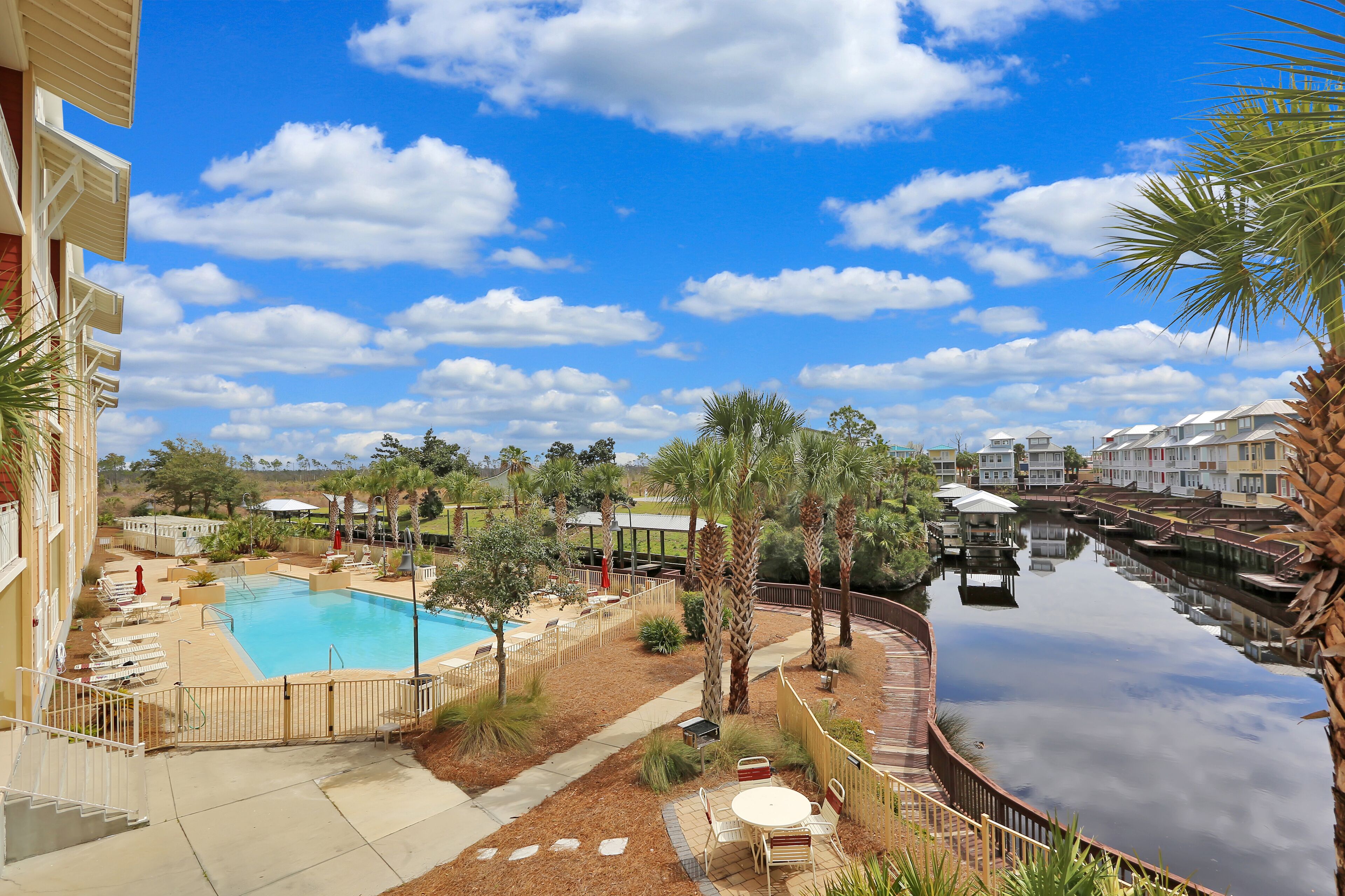 3BR Condo on Canal, Walk from Beach with Community Pool ~ Waterside 203