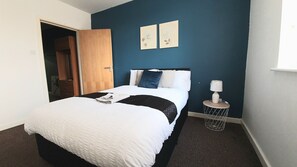 Departamento | 1 habitación, tabla de planchar con plancha, wifi gratis y ropa de cama 