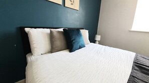 Departamento | 1 habitación, tabla de planchar con plancha, wifi gratis y ropa de cama 
