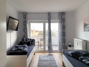 Deluxe Studio, 2 Twin Beds, Balcony | Hypo-allergenic bedding, free WiFi - Wonderful Apartments in the centre of OS (Osnabrueck)