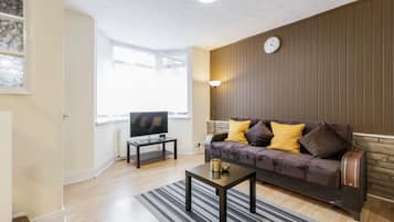 House | Living room | 30-inch TV with digital channels