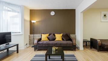 House | Living room | 30-inch TV with digital channels