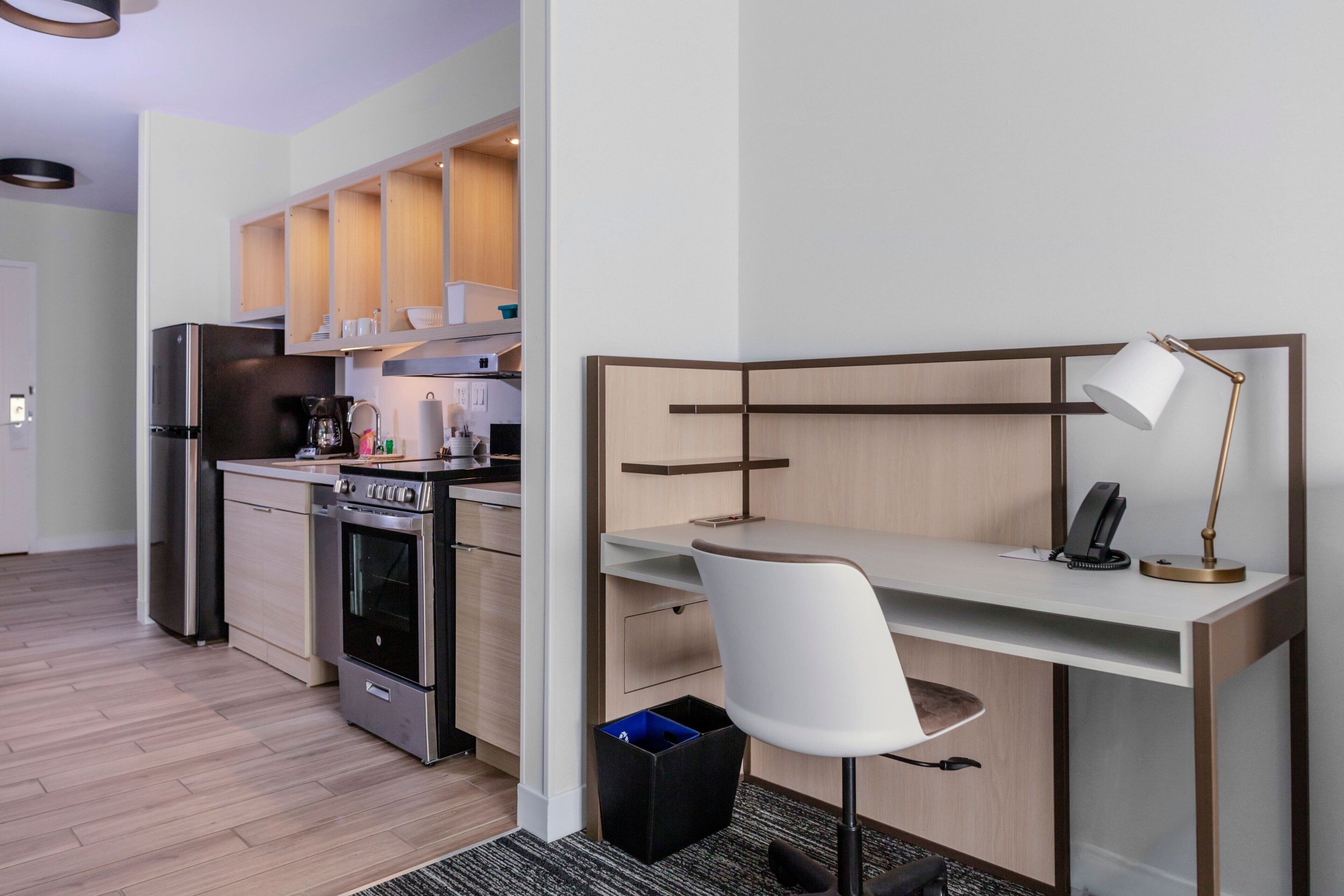 desk, laptop workspace, blackout curtains, iron/ironing board