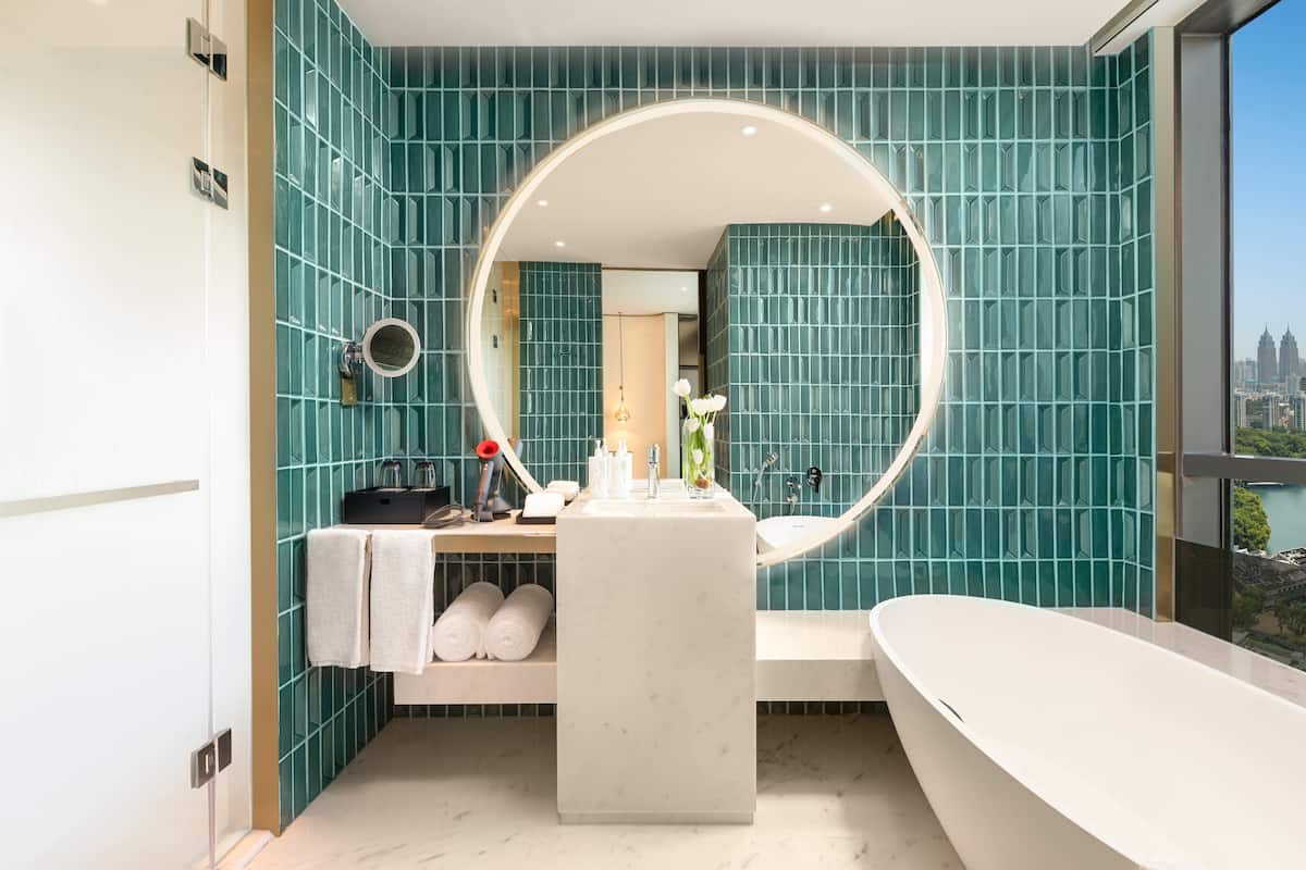 Designer toiletries, hair dryer, bathrobes, slippers