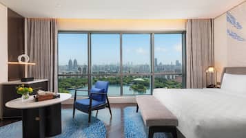 Premium bedding, down comforters, pillowtop beds, minibar