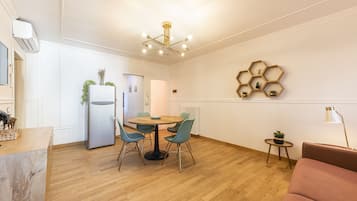 Appartement Confort | Coin séjour | Télévision à écran plat