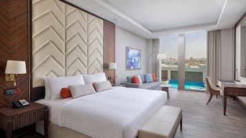 Deluxe Room, 1 King Bed (City View) | Premium bedding, memory foam beds, minibar, in-room safe