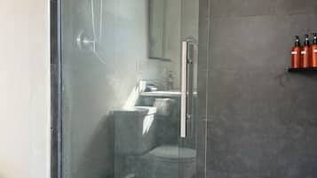 Bathtub, hair dryer, towels, soap