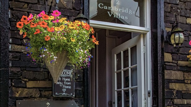 A stone building with a sign reading "Cambridge Villas." - 2 Cambridge Villas (Ambleside)