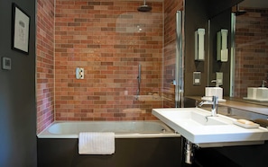 Combined shower/tub, hair dryer, towels, soap