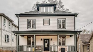 A two-story house with a front porch, a mailbox, and a number '840' on the door. - The Sage Estate - Only 6 Minutes from Downtown (Nashville)