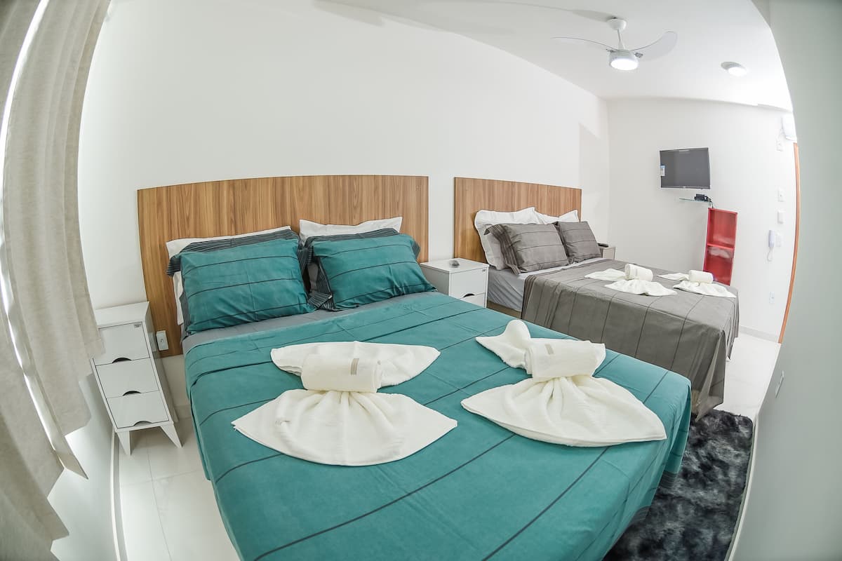Family Room | Minibar, individually decorated, blackout drapes, free WiFi