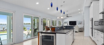 5BR/4.5B Beach House- heated pool, deep water dock, walk to beach!