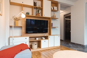 Appartement Galerie | Aire de séjour | Téléviseur