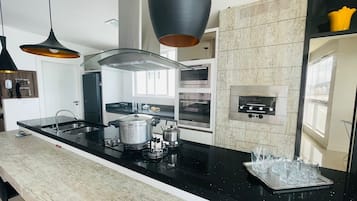 Luxury Apartment | Private kitchen | Full-size fridge, microwave, oven, toaster