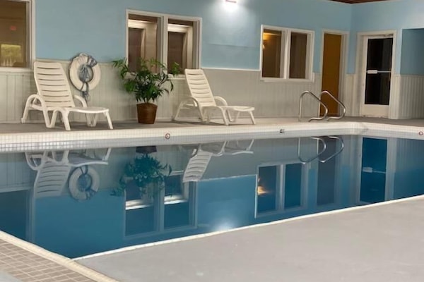 Indoor pool, open noon to 9:30 PM, pool loungers