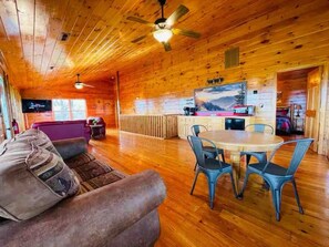 Smart TV, fireplace, books, printers